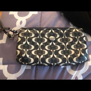 Black and white coach wristlet